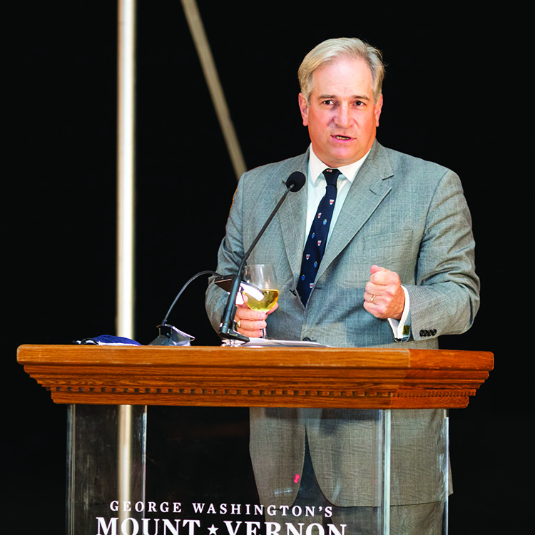 Doug Bradburn speaking at the Homecoming event