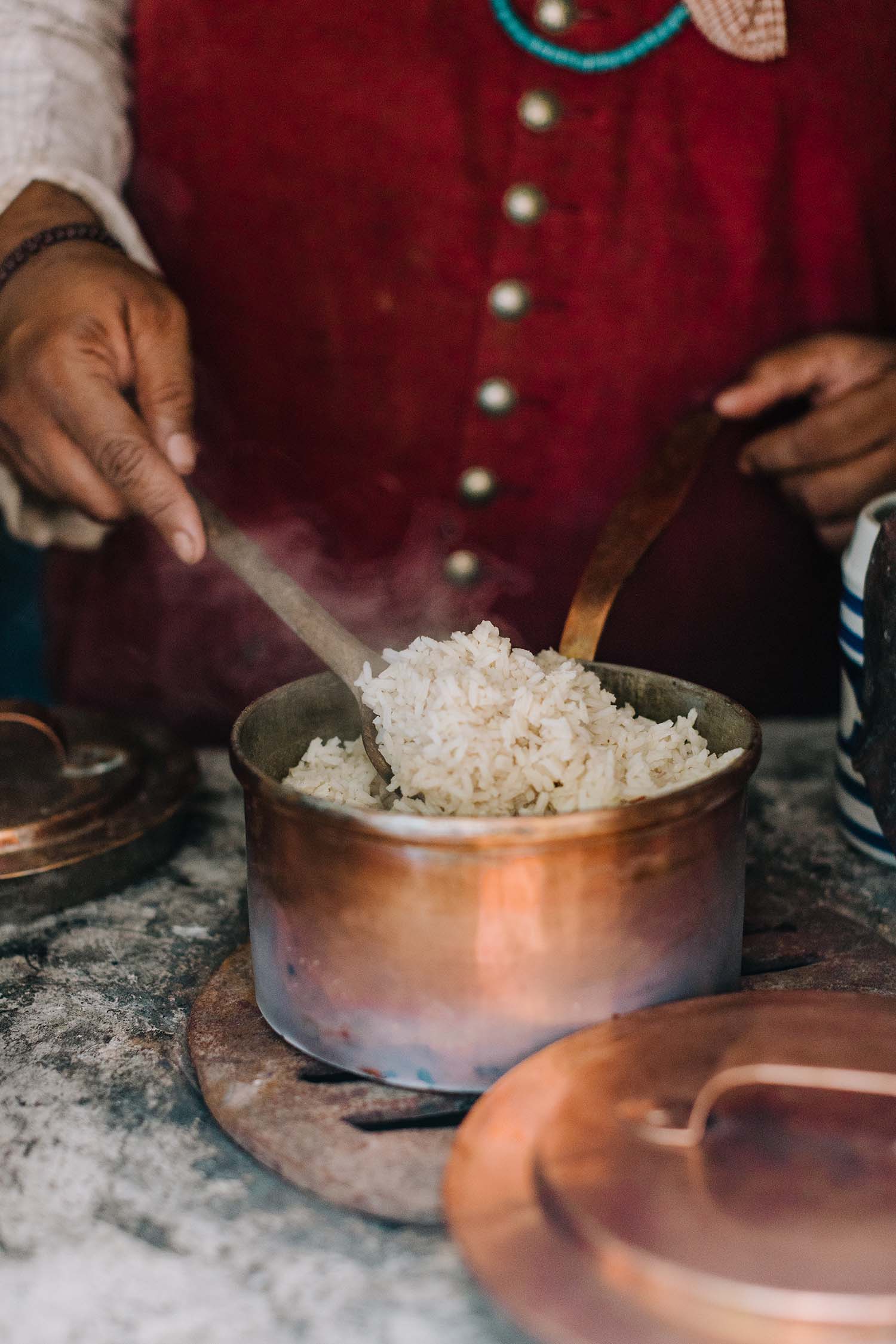 Michael Twitty stirs cooked rice