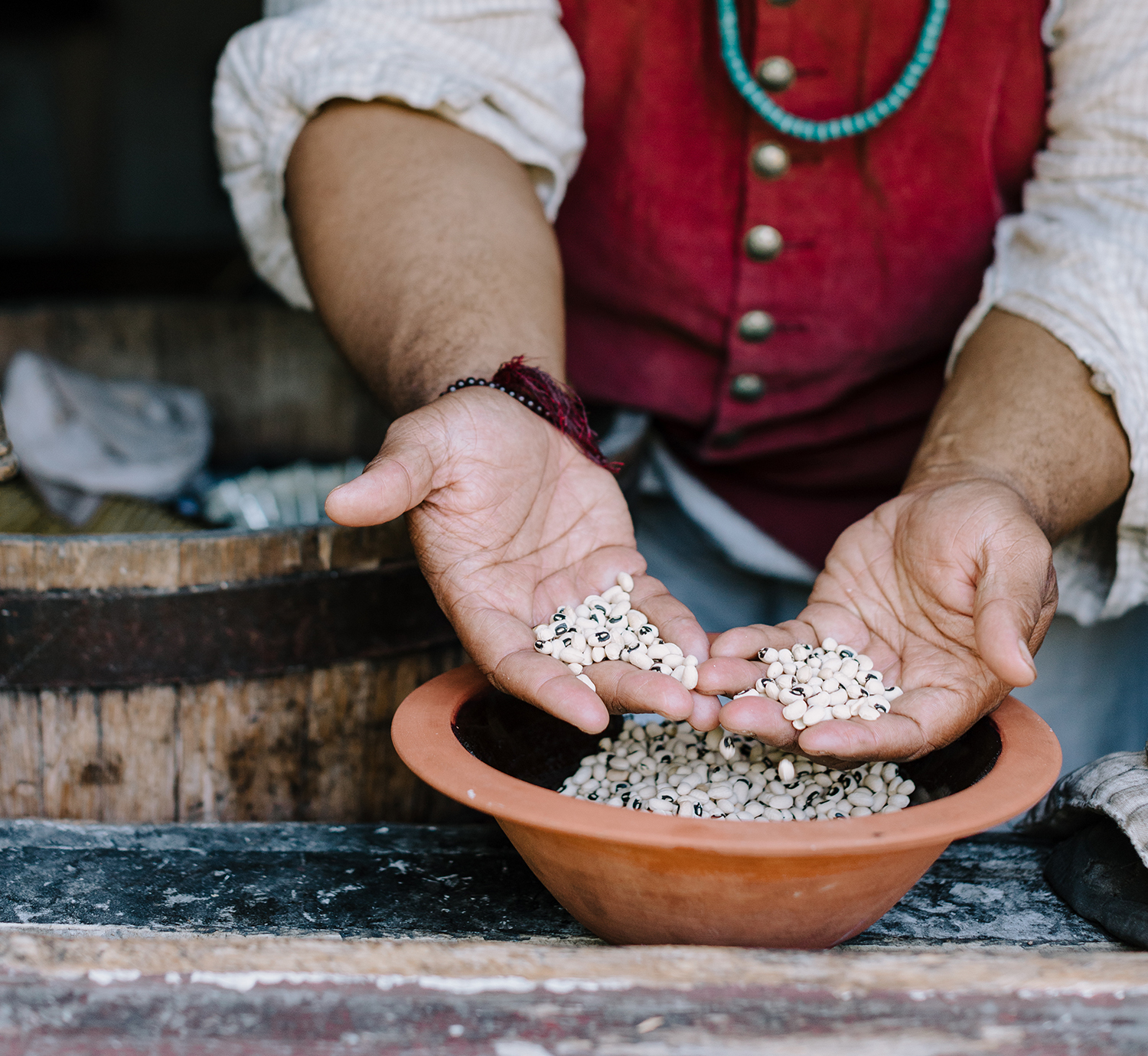 Person holding chickpeas
